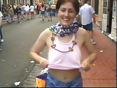 flashing breasts for the camera at mardi gras