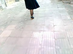 Mature babe walking in black heels